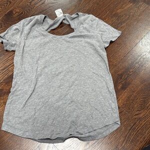 Victoria’s Secret pink short sleeve open back T-shirt, size medium